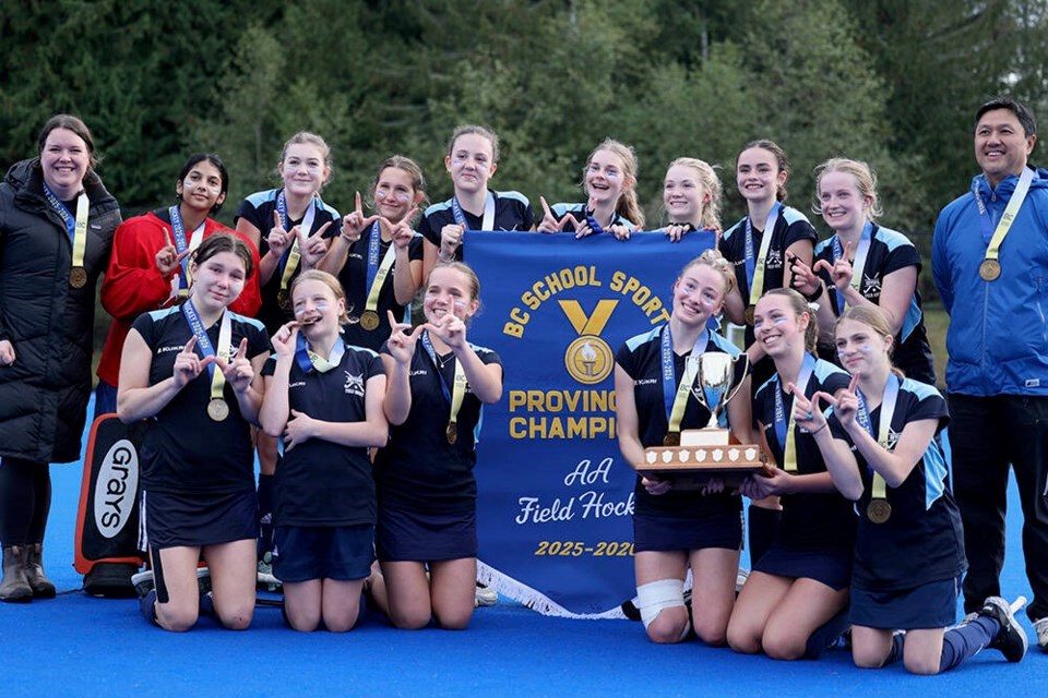 The Seycove Secondary senior girls celebrate their win the in the provincial AA field hockey championship final.