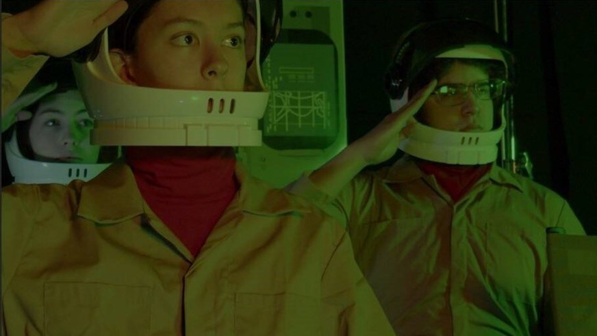 Argyle students Leah Price, Hana Cramer and Alex Robitaille play astronauts in Armageddon Again: The Prequel.